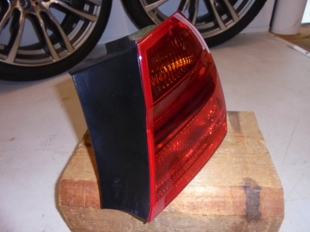 BMW_3er_Heckleuchte_Seitenwand_links_E90_63210406879_1_